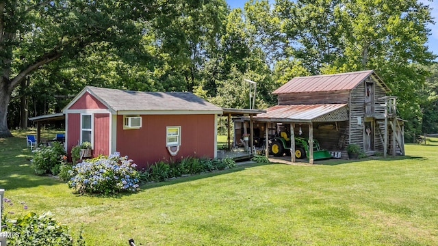 1355 Sykes Rd, Spring Hope, NC 27882 - view of outbuilding with view of wooded area