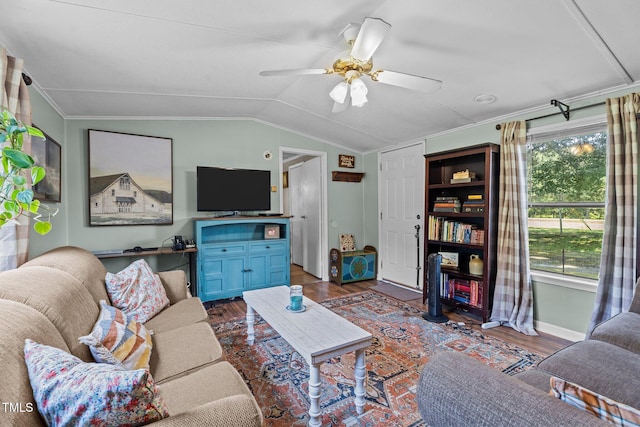 1355 Sykes Rd, Spring Hope, NC 27882 - living area with wood finished floors, vaulted ceiling, a ceiling fan, ornamental molding, and baseboards