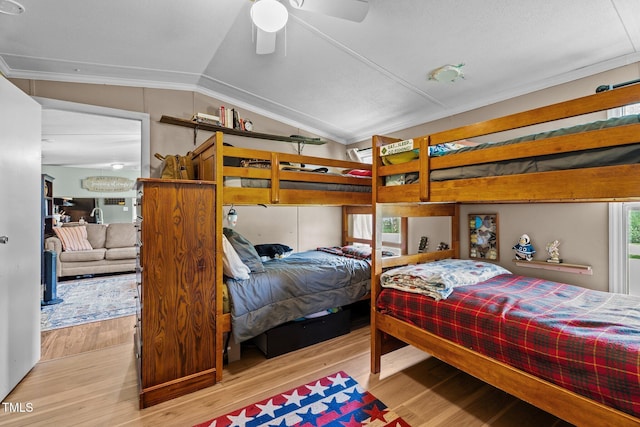 1355 Sykes Rd, Spring Hope, NC 27882 - bedroom with wood finished floors, lofted ceiling, and crown molding