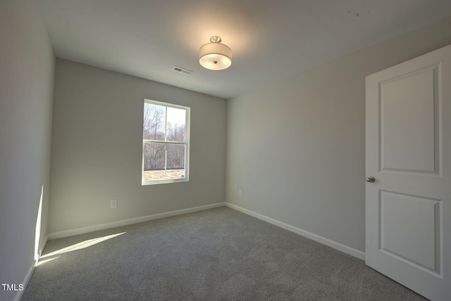 1227 Bessie Ct, Wake Forest, NC 27587 - spare room featuring carpet floors and baseboards