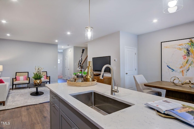 1227 Bessie Ct, Wake Forest, NC 27587 - kitchen with a sink, open floor plan, recessed lighting, dark wood-style flooring, and decorative light fixtures