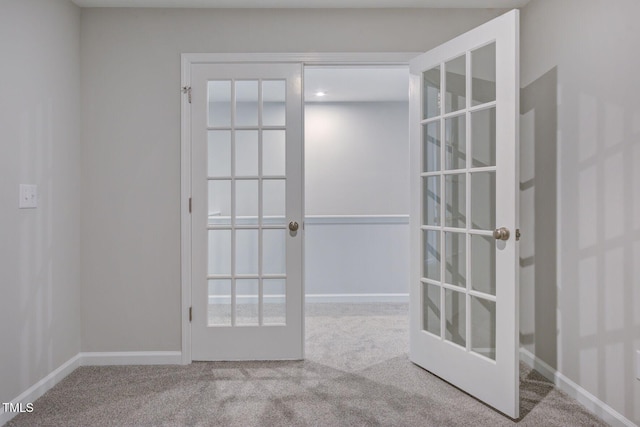 1227 Bessie Ct, Wake Forest, NC 27587 - carpeted spare room featuring french doors and baseboards