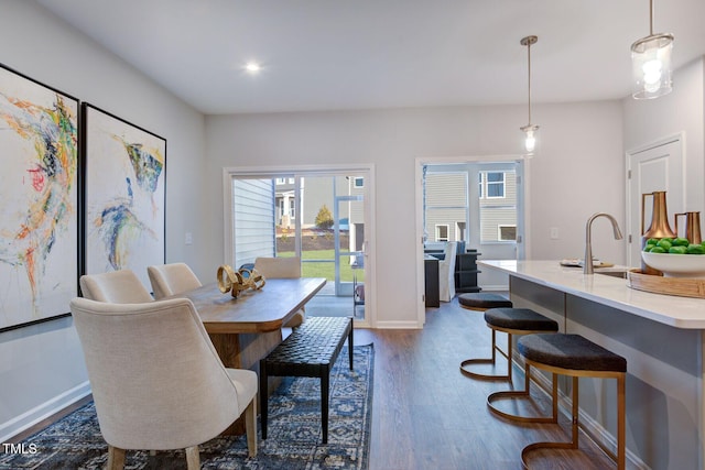 1227 Bessie Ct, Wake Forest, NC 27587 - dining room with dark wood-type flooring, healthy amount of natural light, baseboards, and recessed lighting