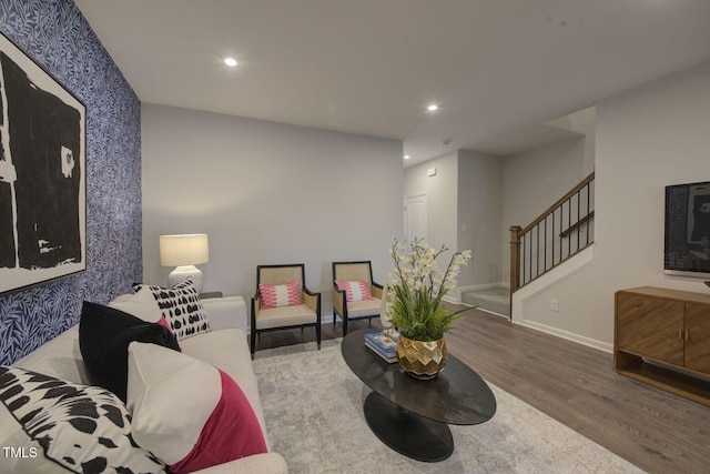 1227 Bessie Ct, Wake Forest, NC 27587 - living room with wallpapered walls, wood finished floors, stairway, baseboards, and recessed lighting
