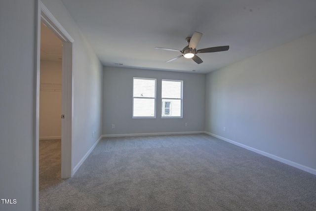 1227 Bessie Ct, Wake Forest, NC 27587 - spare room with carpet floors, ceiling fan, and baseboards