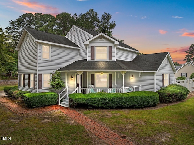 2000 Glissom St, Tarboro, NC 27886 - view of front facade with a porch and roof with shingles