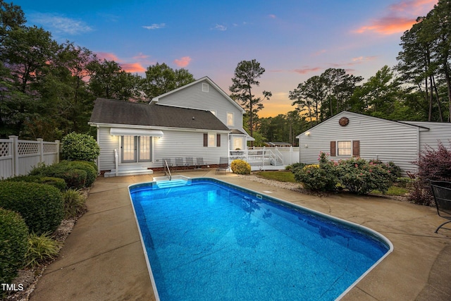 2000 Glissom St, Tarboro, NC 27886 - pool at dusk with a patio