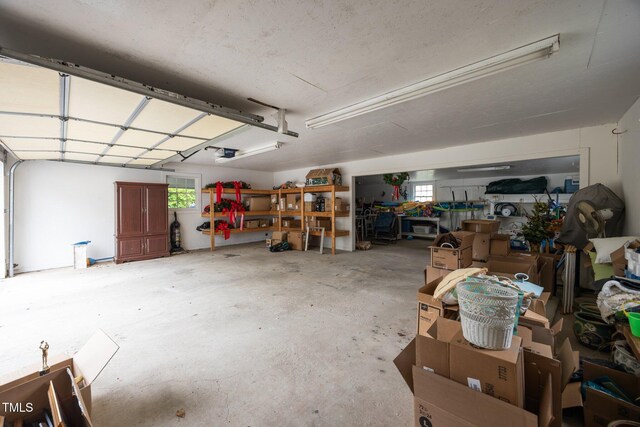 2000 Glissom St, Tarboro, NC 27886 - garage featuring a garage door opener