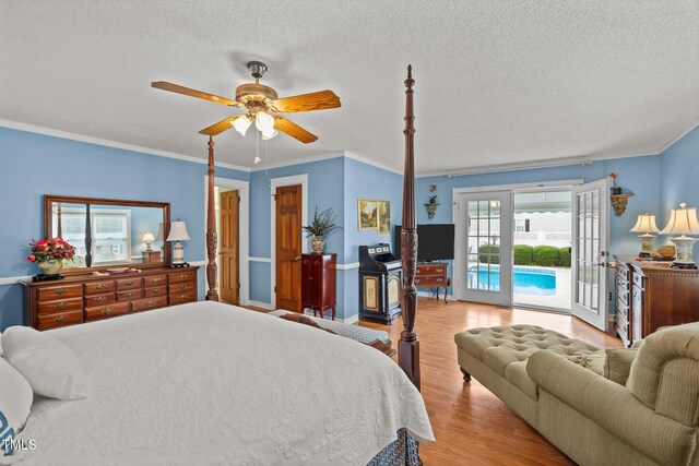 2000 Glissom St, Tarboro, NC 27886 - bedroom featuring access to exterior, light wood finished floors, a textured ceiling, ornamental molding, and a ceiling fan