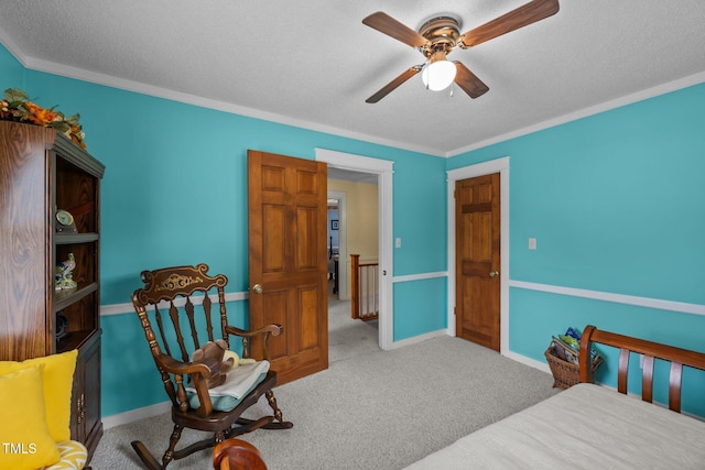 2000 Glissom St, Tarboro, NC 27886 - bedroom with a textured ceiling, carpet floors, crown molding, and a ceiling fan
