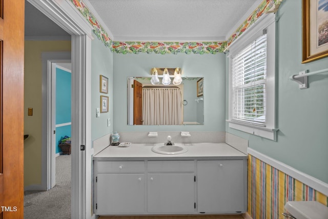 2000 Glissom St, Tarboro, NC 27886 - bathroom featuring vanity, a textured ceiling, and a chandelier