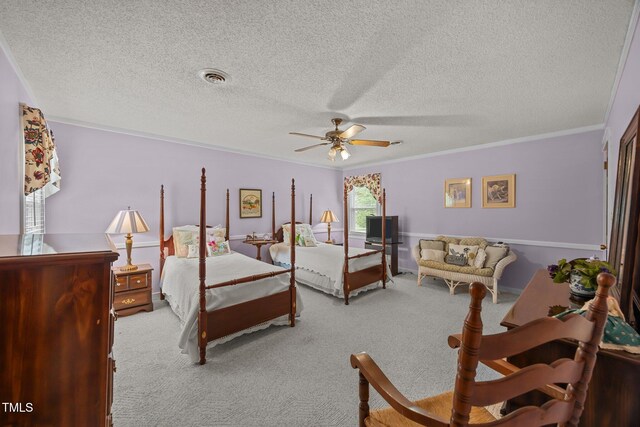 2000 Glissom St, Tarboro, NC 27886 - bedroom featuring carpet, a textured ceiling, crown molding, and a ceiling fan