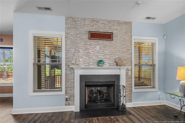 416 Kentucky Derby Ln, Lillington, NC 27546 - detailed view of wood finished floors, a fireplace with flush hearth, and baseboards