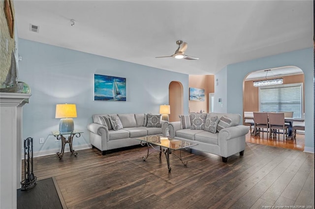 416 Kentucky Derby Ln, Lillington, NC 27546 - living area featuring arched walkways, wood-type flooring, ceiling fan, and baseboards