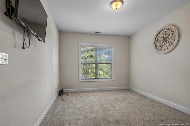 416 Kentucky Derby Ln, Lillington, NC 27546 - carpeted spare room featuring baseboards