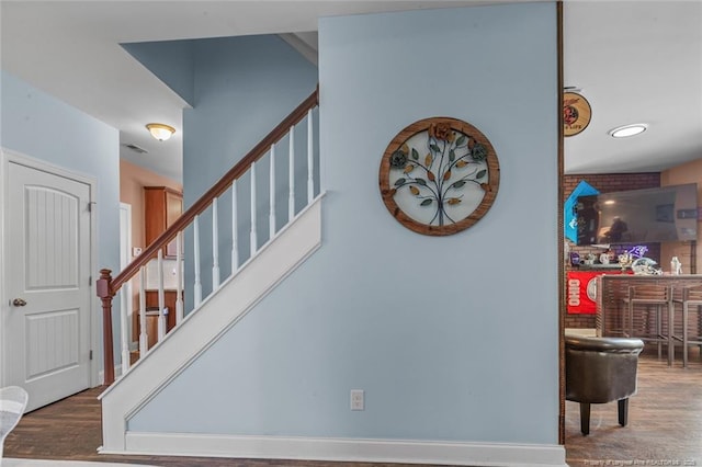 416 Kentucky Derby Ln, Lillington, NC 27546 - staircase with wood finished floors