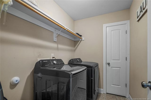 416 Kentucky Derby Ln, Lillington, NC 27546 - laundry area with washer and dryer and baseboards
