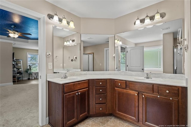416 Kentucky Derby Ln, Lillington, NC 27546 - full bathroom with double vanity, a ceiling fan, and a shower with shower door