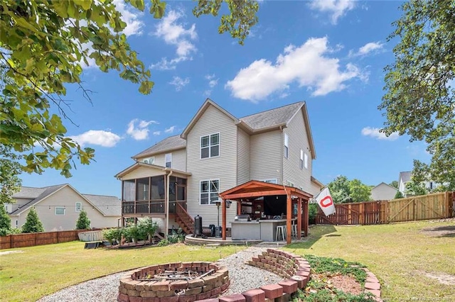 416 Kentucky Derby Ln, Lillington, NC 27546 - rear view of property with a fire pit, a sunroom, a gazebo, and a patio area