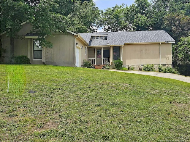918 Dandridge Dr, Fayetteville, NC 28303 - view of front of house featuring a garage, a front lawn, covered porch, and a shingled roof