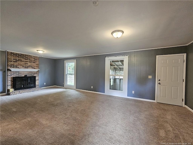 918 Dandridge Dr, Fayetteville, NC 28303 - unfurnished living room featuring carpet, a brick fireplace, baseboards, and ornamental molding
