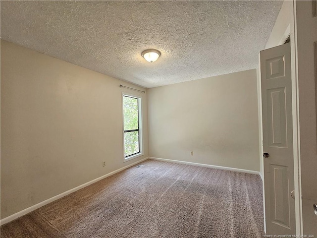 918 Dandridge Dr, Fayetteville, NC 28303 - spare room with carpet flooring, baseboards, and a textured ceiling