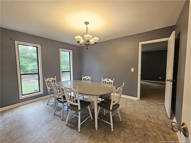 918 Dandridge Dr, Fayetteville, NC 28303 - dining room with a chandelier and baseboards