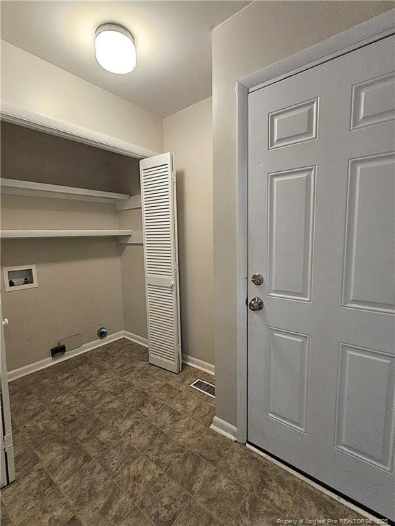 918 Dandridge Dr, Fayetteville, NC 28303 - laundry room featuring washer hookup, a heating unit, and baseboards