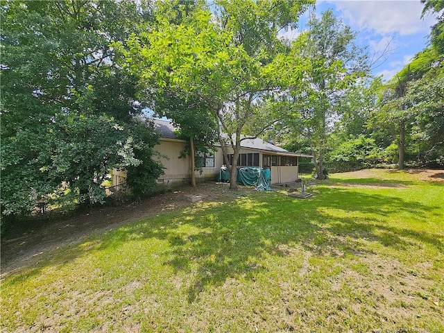 918 Dandridge Dr, Fayetteville, NC 28303 - view of green lawn with a sunroom