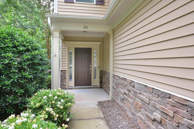 321 Westgrove Ct, Durham, NC 27703 - property entrance featuring stone siding