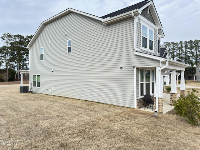 13 Knotty Pine Ln, Clayton, NC 27520 - view of home's exterior with central AC unit and a patio