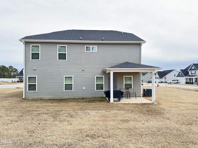 13 Knotty Pine Ln, Clayton, NC 27520 - back of property featuring a patio area, central AC, and a yard