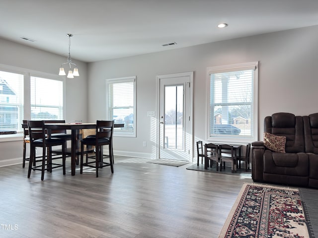 13 Knotty Pine Ln, Clayton, NC 27520 - dining area with a chandelier, wood finished floors, baseboards, and recessed lighting