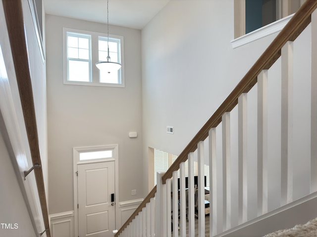 13 Knotty Pine Ln, Clayton, NC 27520 - foyer featuring stairs and a high ceiling