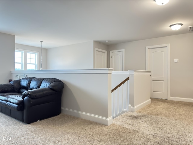 13 Knotty Pine Ln, Clayton, NC 27520 - living room featuring light colored carpet and baseboards