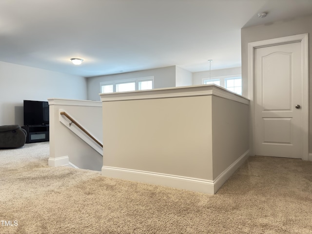 13 Knotty Pine Ln, Clayton, NC 27520 - hallway featuring an upstairs landing, carpet flooring, plenty of natural light, and baseboards