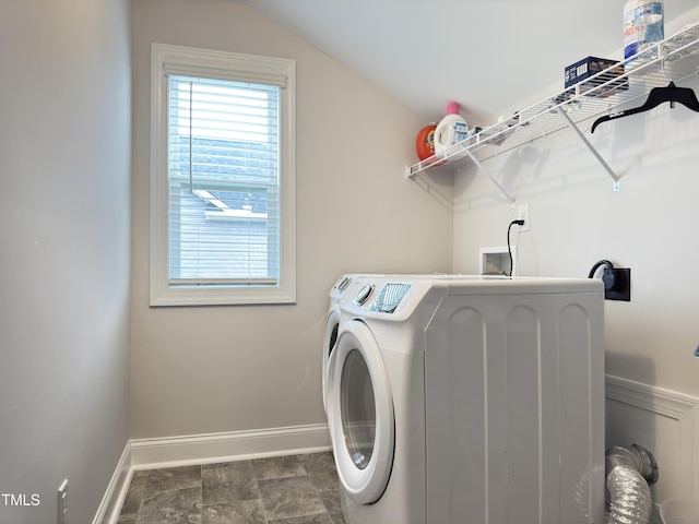 13 Knotty Pine Ln, Clayton, NC 27520 - washroom with washing machine and dryer, baseboards, and stone finish flooring