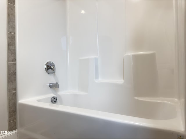 13 Knotty Pine Ln, Clayton, NC 27520 - bathroom featuring tub / shower combination
