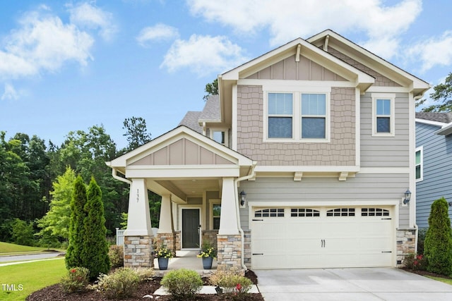137 Azalea View Way, Holly Springs, NC 27540 - craftsman-style home with a garage, concrete driveway, board and batten siding, and stone siding