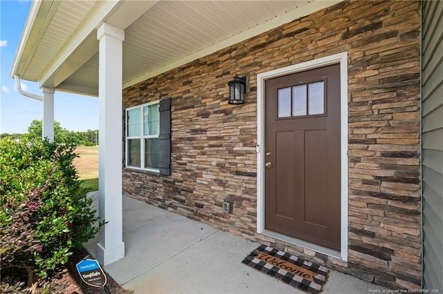5540 Mountain Run Dr, Hope Mills, NC 28348 - entrance to property featuring stone siding and covered porch