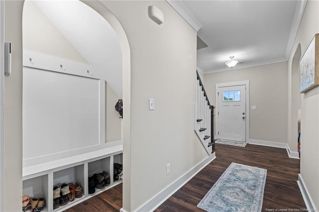 5540 Mountain Run Dr, Hope Mills, NC 28348 - entrance foyer with baseboards, stairway, wood finished floors, crown molding, and arched walkways