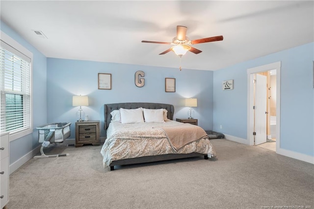 5540 Mountain Run Dr, Hope Mills, NC 28348 - carpeted bedroom with baseboards, a ceiling fan, and connected bathroom
