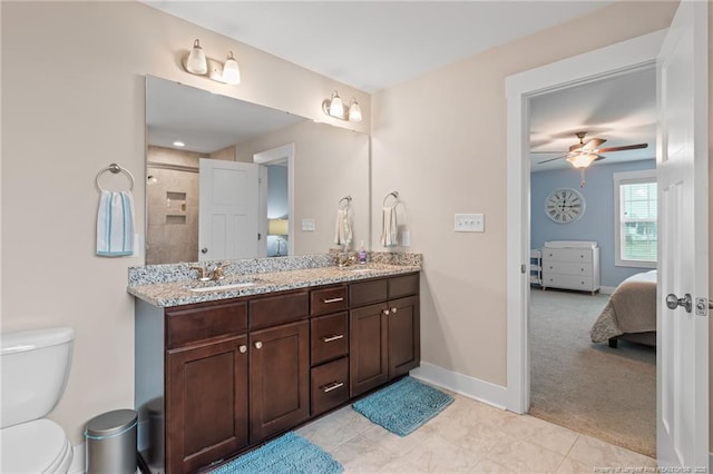 5540 Mountain Run Dr, Hope Mills, NC 28348 - full bathroom featuring connected bathroom, double vanity, tile patterned floors, and ceiling fan