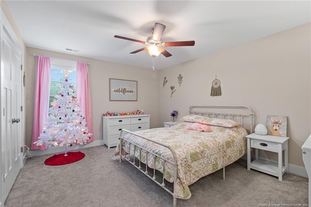 5540 Mountain Run Dr, Hope Mills, NC 28348 - bedroom with light colored carpet and a ceiling fan