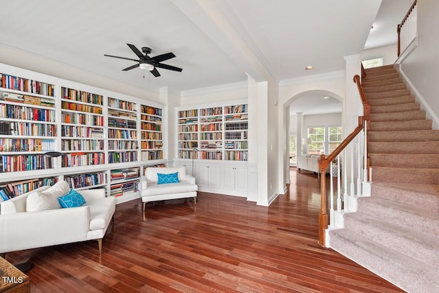 108 Teagan Ct, Chapel Hill, NC 27516 - living area with crown molding, wood finished floors, arched walkways, a ceiling fan, and stairway