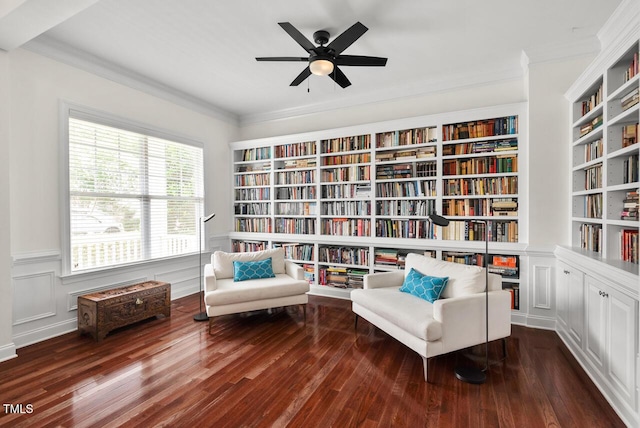 108 Teagan Ct, Chapel Hill, NC 27516 - sitting room featuring bookshelves, wood-type flooring, built in shelves, ornamental molding, and a ceiling fan