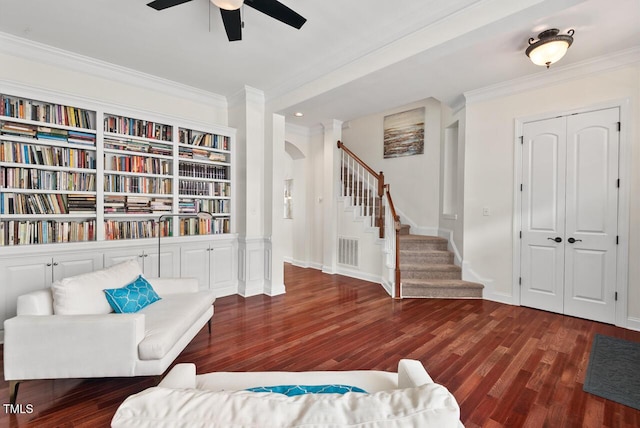 108 Teagan Ct, Chapel Hill, NC 27516 - living area featuring ornamental molding, a ceiling fan, wood finished floors, stairway, and built in features