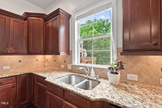 108 Teagan Ct, Chapel Hill, NC 27516 - kitchen featuring decorative backsplash and light stone countertops