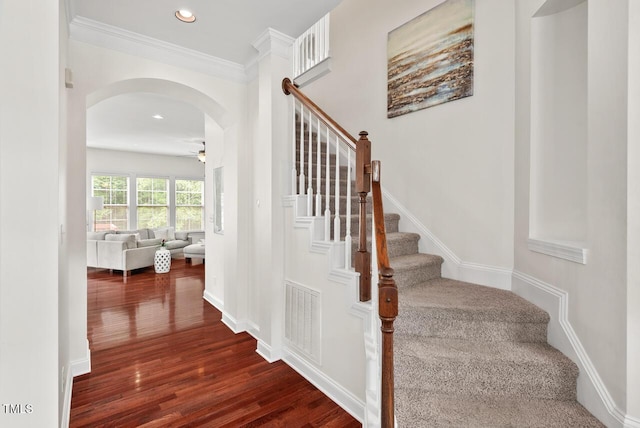 108 Teagan Ct, Chapel Hill, NC 27516 - stairs featuring wood finished floors, a ceiling fan, arched walkways, recessed lighting, and ornamental molding