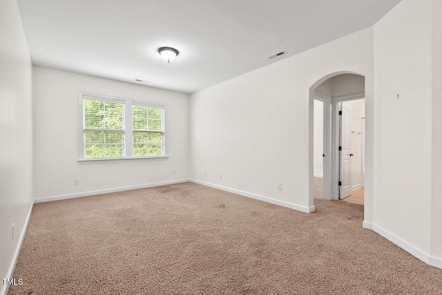 108 Teagan Ct, Chapel Hill, NC 27516 - unfurnished room featuring arched walkways and light colored carpet